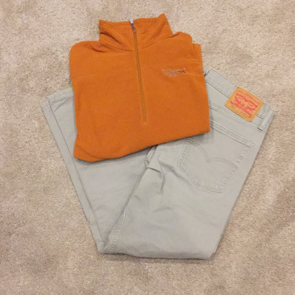 Levi jeans and orange 1/4 zip sweater